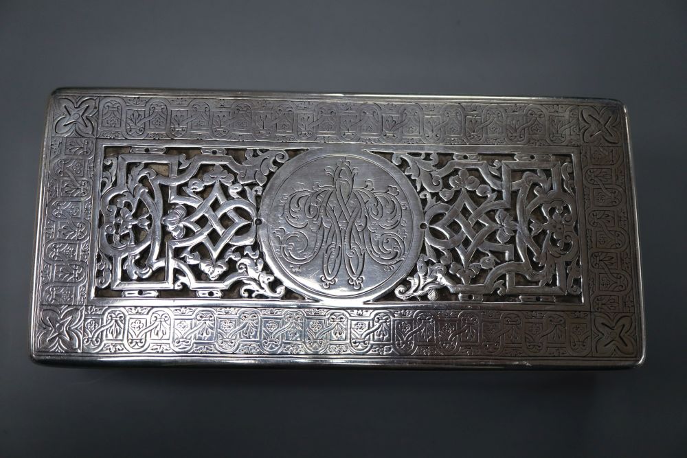 A continental white metal mounted rectangular cigarette box, with pierced engraved lid, 18.6cm, gross 17.5oz.